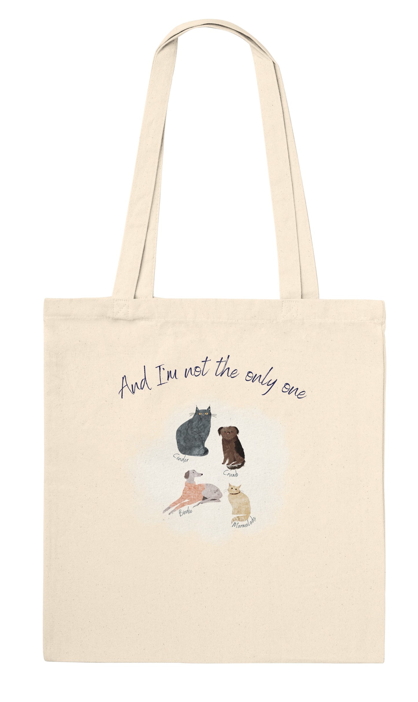 Beige tote bag with illustrations of dogs and text on a white background